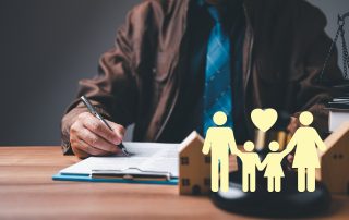 Reynaldo Garza III, Attorney at Law in Brownsville Texas -A legal professional is seen drafting documents related to family law.