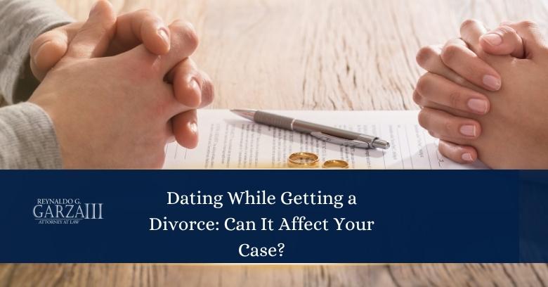 Two people sit across from each other at a table with divorce papers, wedding rings, and a pen between them. A banner reads, Dating While Getting a Divorce: Can It Affect Your Case?.